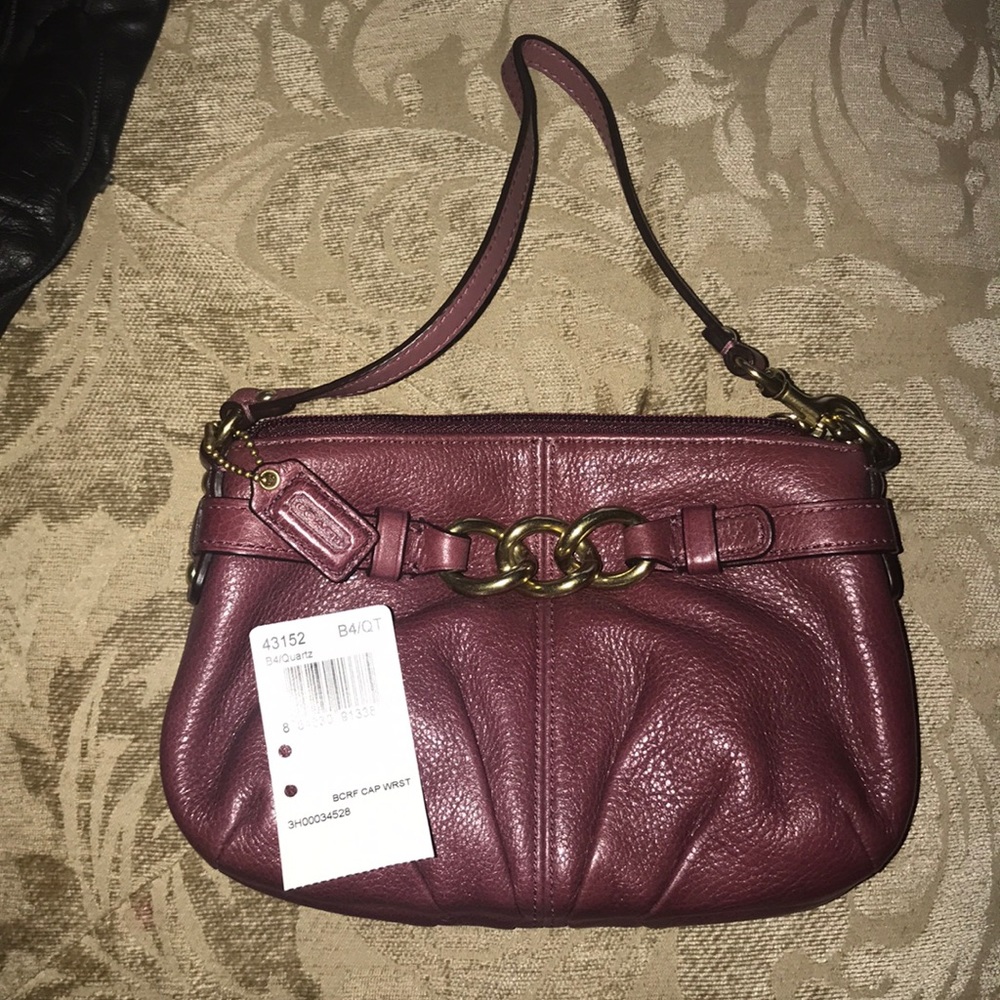 Coach Breast cancer wristlet